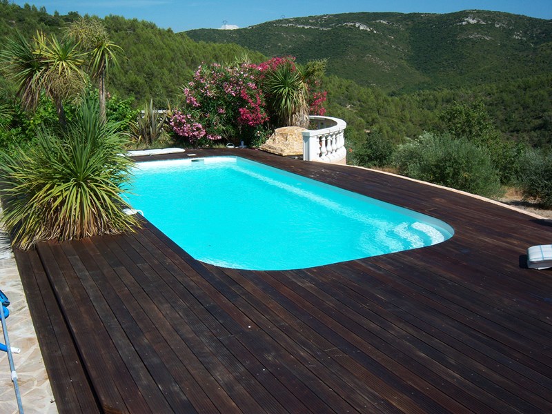 Piscine coque fond plat lac oro  9.40 mètres